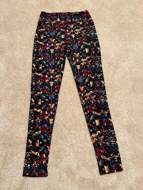 LuLaRoe Black Leggings with Red, Yellow and Blue Floral Scrolls